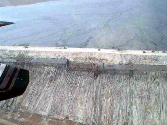 Aerial view of downstream face of Quebrada Honda dam