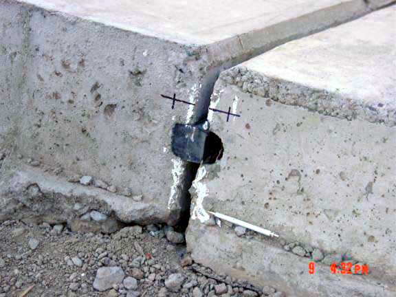 Separation of joint in concrete facing along Torata Dam