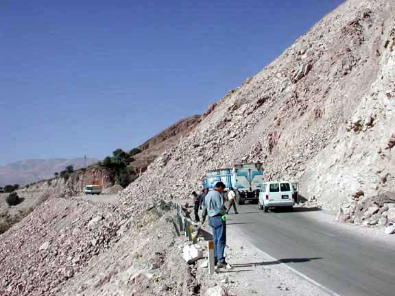 Slope failure on a damaged roadway